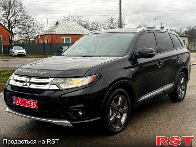 Чорний Міцубісі Аутлендер, об'ємом двигуна 3 л та пробігом 99 тис. км за 15998 $, фото 2 на Automoto.ua