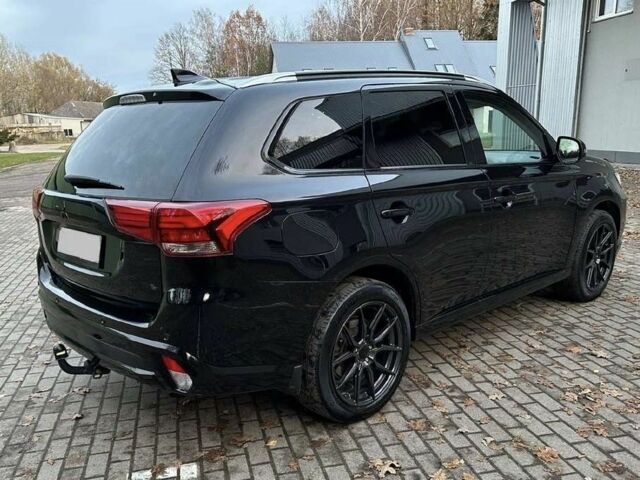 Чорний Міцубісі Аутлендер, об'ємом двигуна 0 л та пробігом 135 тис. км за 8600 $, фото 1 на Automoto.ua