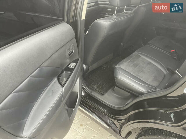 Чорний Міцубісі Аутлендер, об'ємом двигуна 2 л та пробігом 145 тис. км за 21200 $, фото 10 на Automoto.ua