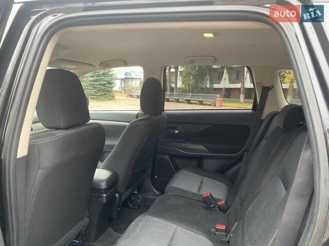 Чорний Міцубісі Аутлендер, об'ємом двигуна 2.36 л та пробігом 192 тис. км за 14200 $, фото 15 на Automoto.ua