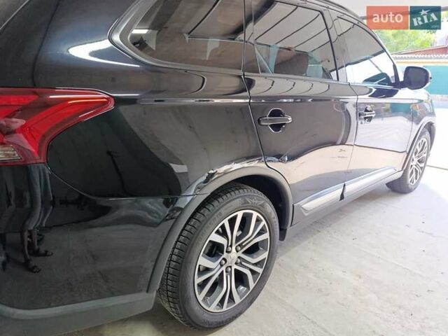 Черный Мицубиси Аутлендер, объемом двигателя 2.36 л и пробегом 120 тыс. км за 16900 $, фото 12 на Automoto.ua