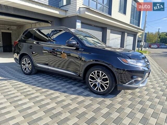 Черный Мицубиси Аутлендер, объемом двигателя 2.36 л и пробегом 120 тыс. км за 16900 $, фото 6 на Automoto.ua