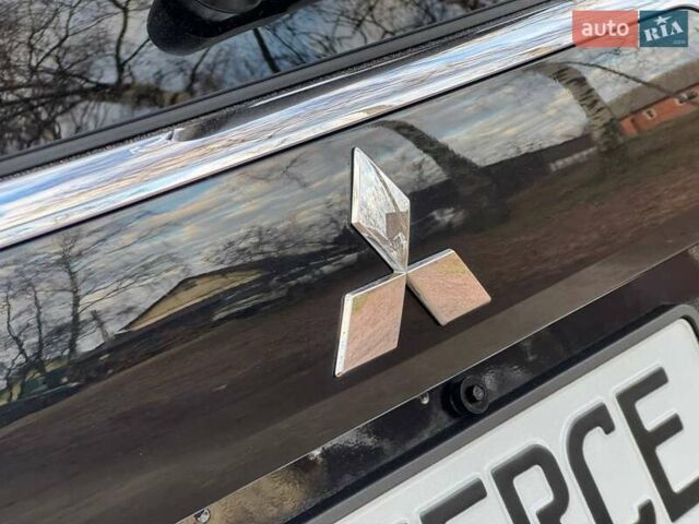 Черный Мицубиси Аутлендер, объемом двигателя 3 л и пробегом 99 тыс. км за 15800 $, фото 20 на Automoto.ua