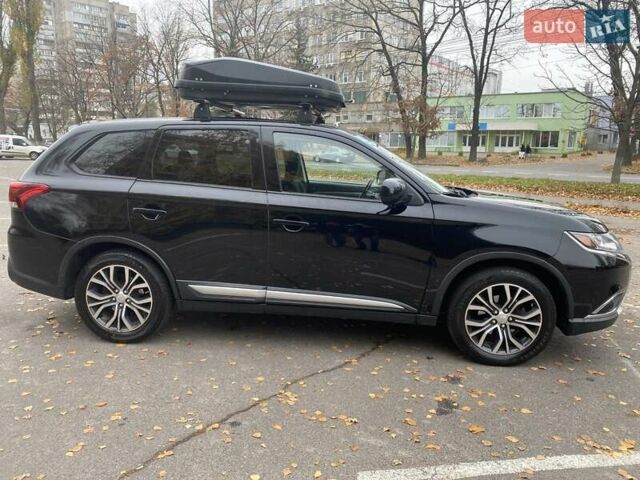 Чорний Міцубісі Аутлендер, об'ємом двигуна 2.36 л та пробігом 192 тис. км за 14200 $, фото 7 на Automoto.ua