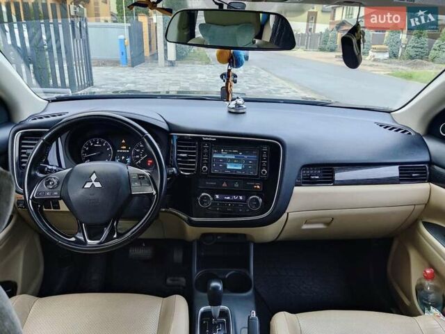 Чорний Міцубісі Аутлендер, об'ємом двигуна 2.36 л та пробігом 213 тис. км за 14500 $, фото 11 на Automoto.ua