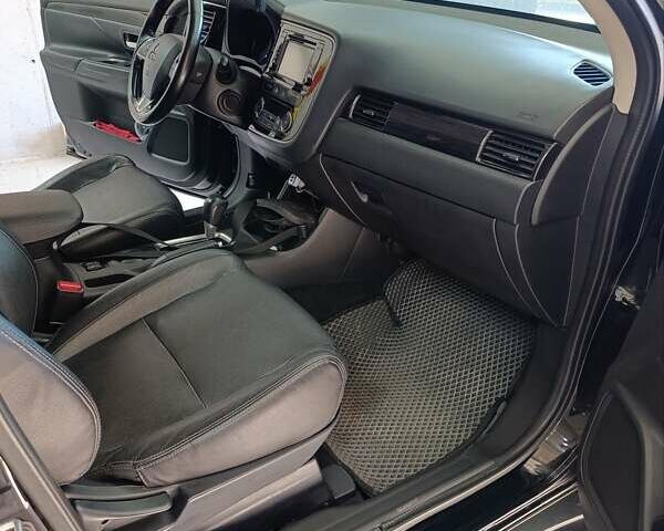 Черный Мицубиси Аутлендер, объемом двигателя 2.36 л и пробегом 120 тыс. км за 16900 $, фото 33 на Automoto.ua