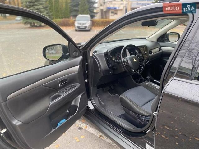 Чорний Міцубісі Аутлендер, об'ємом двигуна 2.36 л та пробігом 192 тис. км за 14200 $, фото 12 на Automoto.ua