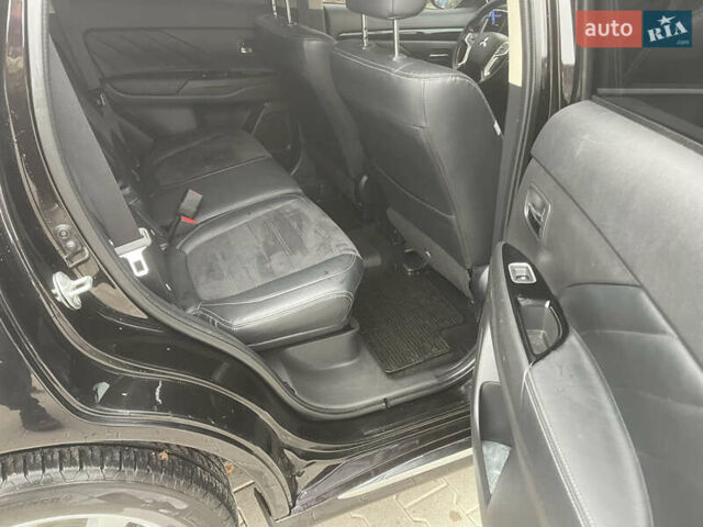 Чорний Міцубісі Аутлендер, об'ємом двигуна 2 л та пробігом 145 тис. км за 21200 $, фото 15 на Automoto.ua