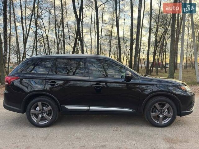 Черный Мицубиси Аутлендер, объемом двигателя 3 л и пробегом 99 тыс. км за 15800 $, фото 12 на Automoto.ua