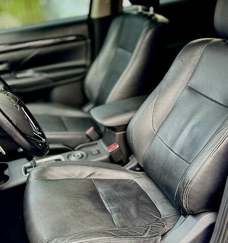 Чорний Міцубісі Аутлендер, об'ємом двигуна 2.36 л та пробігом 154 тис. км за 19500 $, фото 18 на Automoto.ua