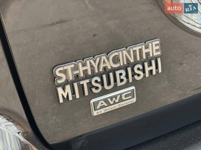 Черный Мицубиси Аутлендер, объемом двигателя 3 л и пробегом 99 тыс. км за 15800 $, фото 18 на Automoto.ua