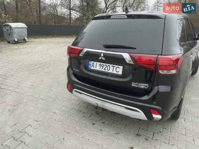 Чорний Міцубісі Аутлендер, об'ємом двигуна 2 л та пробігом 145 тис. км за 21200 $, фото 12 на Automoto.ua