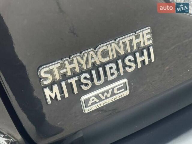 Черный Мицубиси Аутлендер, объемом двигателя 3 л и пробегом 99 тыс. км за 15980 $, фото 15 на Automoto.ua