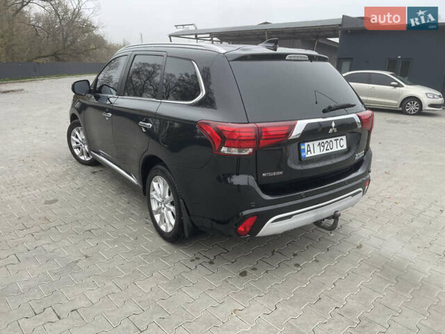 Чорний Міцубісі Аутлендер, об'ємом двигуна 2 л та пробігом 145 тис. км за 21200 $, фото 11 на Automoto.ua