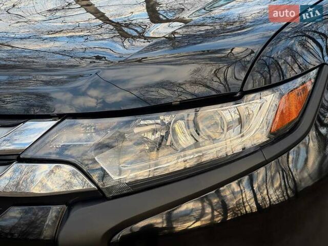 Черный Мицубиси Аутлендер, объемом двигателя 3 л и пробегом 99 тыс. км за 15800 $, фото 5 на Automoto.ua