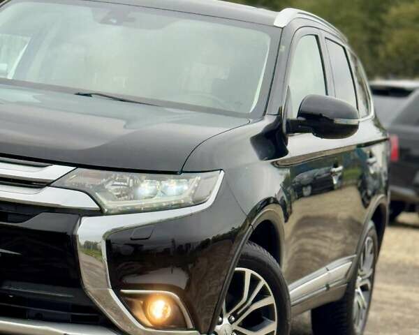 Чорний Міцубісі Аутлендер, об'ємом двигуна 2.2 л та пробігом 188 тис. км за 16999 $, фото 5 на Automoto.ua