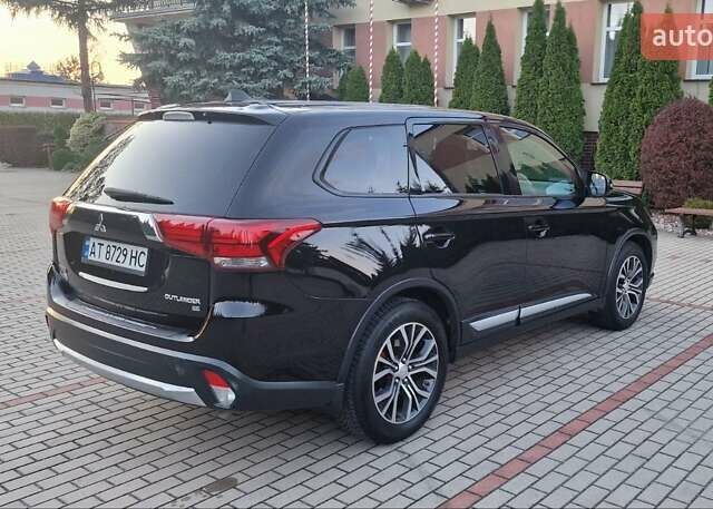 Черный Мицубиси Аутлендер, объемом двигателя 2.36 л и пробегом 168 тыс. км за 14999 $, фото 3 на Automoto.ua