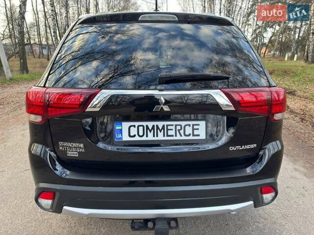 Черный Мицубиси Аутлендер, объемом двигателя 3 л и пробегом 99 тыс. км за 15800 $, фото 21 на Automoto.ua