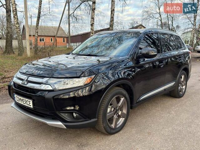Черный Мицубиси Аутлендер, объемом двигателя 3 л и пробегом 99 тыс. км за 15800 $, фото 4 на Automoto.ua