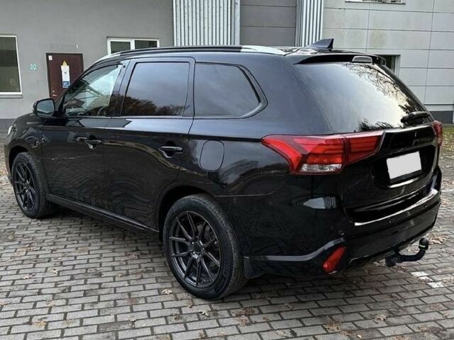 Чорний Міцубісі Аутлендер, об'ємом двигуна 0 л та пробігом 135 тис. км за 8600 $, фото 4 на Automoto.ua