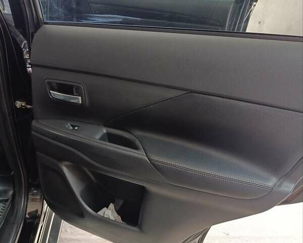 Черный Мицубиси Аутлендер, объемом двигателя 2.36 л и пробегом 120 тыс. км за 16900 $, фото 37 на Automoto.ua