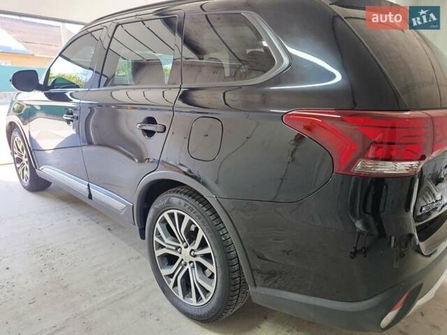 Черный Мицубиси Аутлендер, объемом двигателя 2.36 л и пробегом 120 тыс. км за 16900 $, фото 14 на Automoto.ua