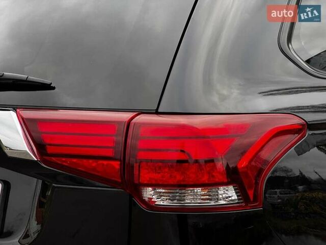 Черный Мицубиси Аутлендер, объемом двигателя 3 л и пробегом 99 тыс. км за 15980 $, фото 12 на Automoto.ua