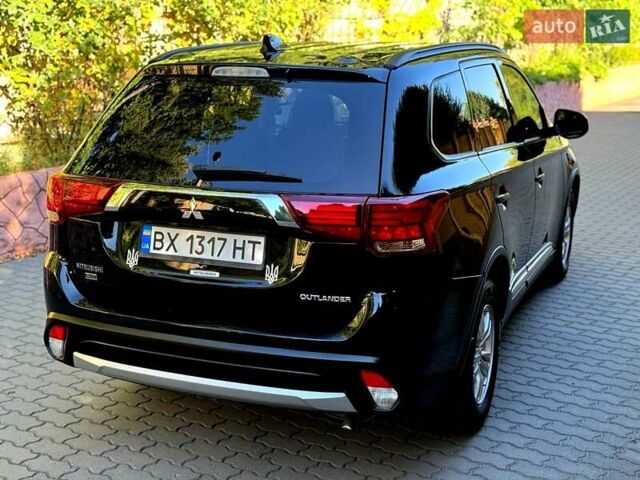 Чорний Міцубісі Аутлендер, об'ємом двигуна 2.36 л та пробігом 130 тис. км за 13500 $, фото 3 на Automoto.ua