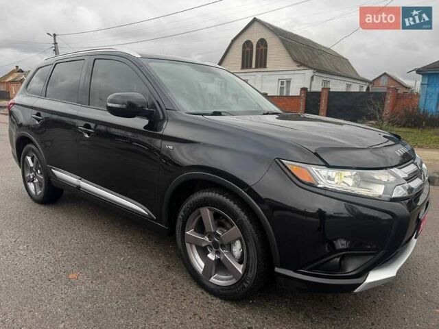 Черный Мицубиси Аутлендер, объемом двигателя 3 л и пробегом 99 тыс. км за 15980 $, фото 5 на Automoto.ua