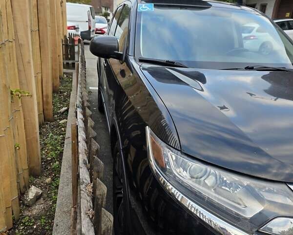 Черный Мицубиси Аутлендер, объемом двигателя 2.4 л и пробегом 195 тыс. км за 13953 $, фото 4 на Automoto.ua