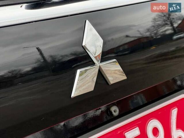 Черный Мицубиси Аутлендер, объемом двигателя 3 л и пробегом 99 тыс. км за 15980 $, фото 14 на Automoto.ua