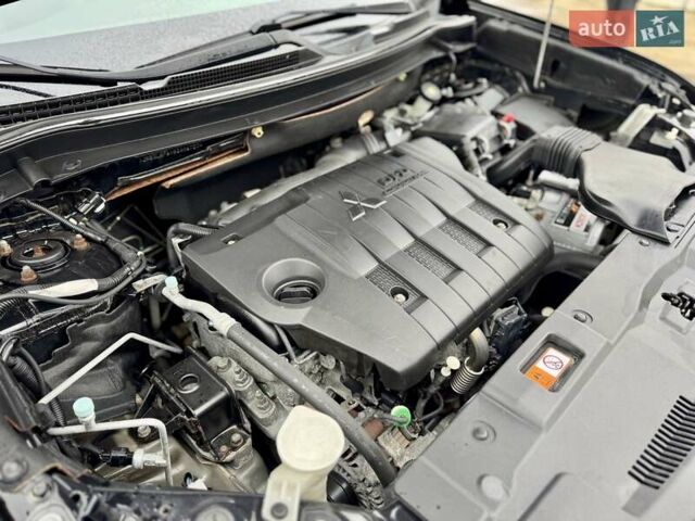 Чорний Міцубісі Аутлендер, об'ємом двигуна 2.2 л та пробігом 188 тис. км за 16999 $, фото 57 на Automoto.ua