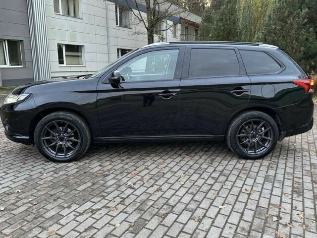 Чорний Міцубісі Аутлендер, об'ємом двигуна 0 л та пробігом 135 тис. км за 8600 $, фото 3 на Automoto.ua