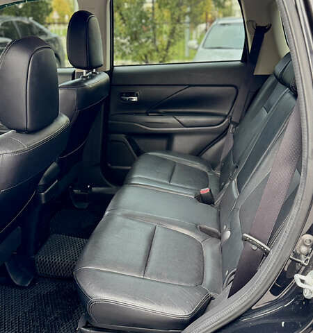 Чорний Міцубісі Аутлендер, об'ємом двигуна 2.36 л та пробігом 154 тис. км за 19500 $, фото 16 на Automoto.ua