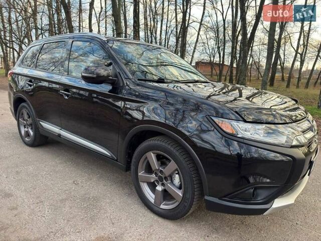 Черный Мицубиси Аутлендер, объемом двигателя 3 л и пробегом 99 тыс. км за 15800 $, фото 8 на Automoto.ua