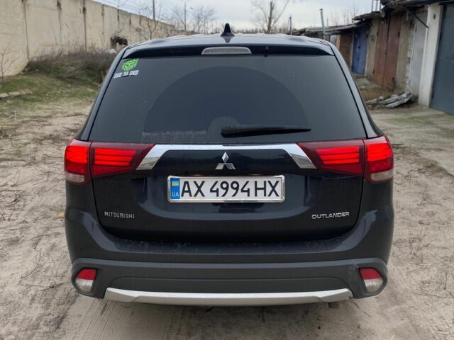 Черный Мицубиси Аутлендер, объемом двигателя 2.4 л и пробегом 185 тыс. км за 14300 $, фото 6 на Automoto.ua