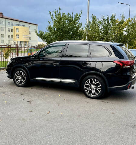 Чорний Міцубісі Аутлендер, об'ємом двигуна 2.36 л та пробігом 154 тис. км за 19500 $, фото 27 на Automoto.ua