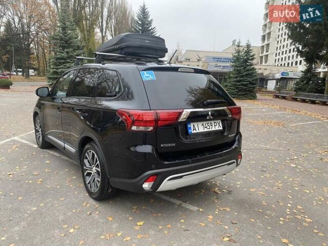 Чорний Міцубісі Аутлендер, об'ємом двигуна 2.36 л та пробігом 192 тис. км за 14200 $, фото 3 на Automoto.ua