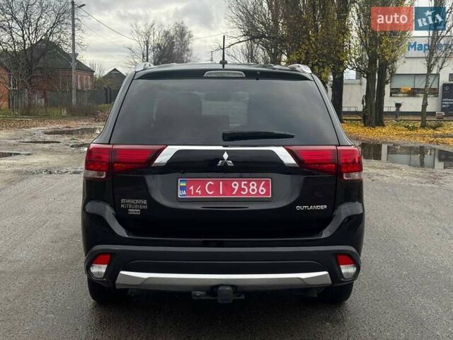 Черный Мицубиси Аутлендер, объемом двигателя 3 л и пробегом 99 тыс. км за 15980 $, фото 9 на Automoto.ua