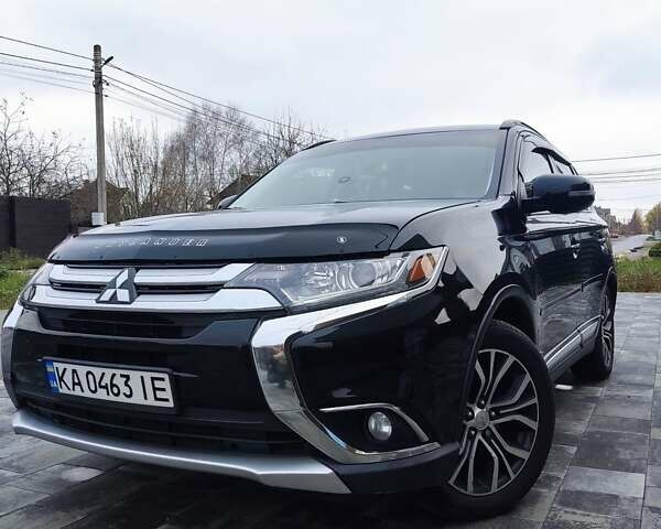 Чорний Міцубісі Аутлендер, об'ємом двигуна 2.36 л та пробігом 213 тис. км за 14500 $, фото 1 на Automoto.ua
