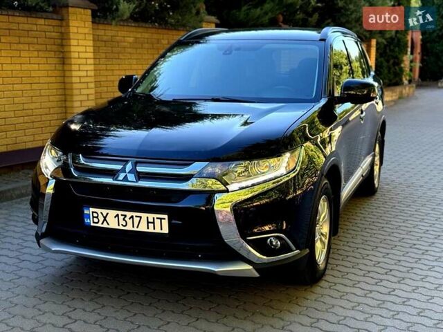 Чорний Міцубісі Аутлендер, об'ємом двигуна 2.36 л та пробігом 130 тис. км за 13500 $, фото 7 на Automoto.ua