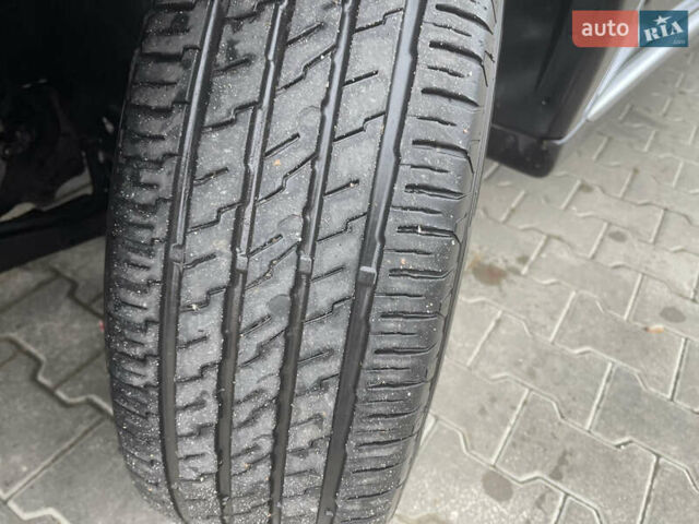 Чорний Міцубісі Аутлендер, об'ємом двигуна 2 л та пробігом 145 тис. км за 21200 $, фото 4 на Automoto.ua