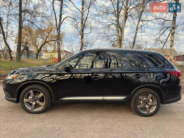 Черный Мицубиси Аутлендер, объемом двигателя 3 л и пробегом 99 тыс. км за 15800 $, фото 11 на Automoto.ua