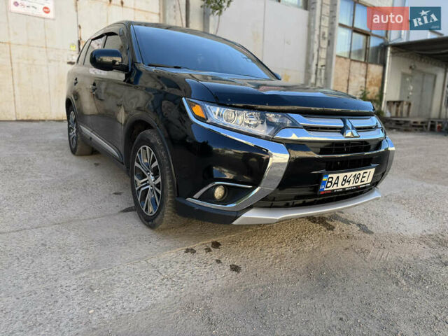 Черный Мицубиси Аутлендер, объемом двигателя 2.36 л и пробегом 108 тыс. км за 14600 $, фото 18 на Automoto.ua