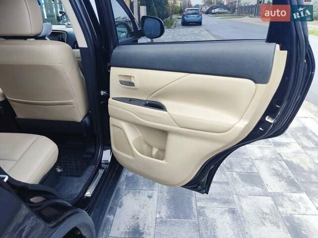 Чорний Міцубісі Аутлендер, об'ємом двигуна 2.36 л та пробігом 213 тис. км за 14500 $, фото 15 на Automoto.ua