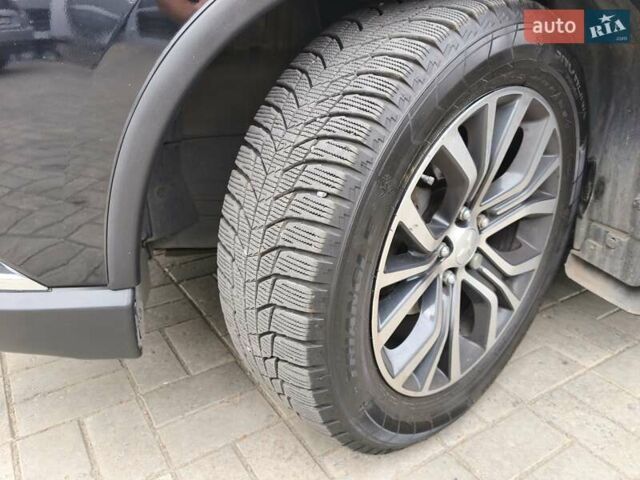 Чорний Міцубісі Аутлендер, об'ємом двигуна 2.36 л та пробігом 162 тис. км за 14450 $, фото 29 на Automoto.ua