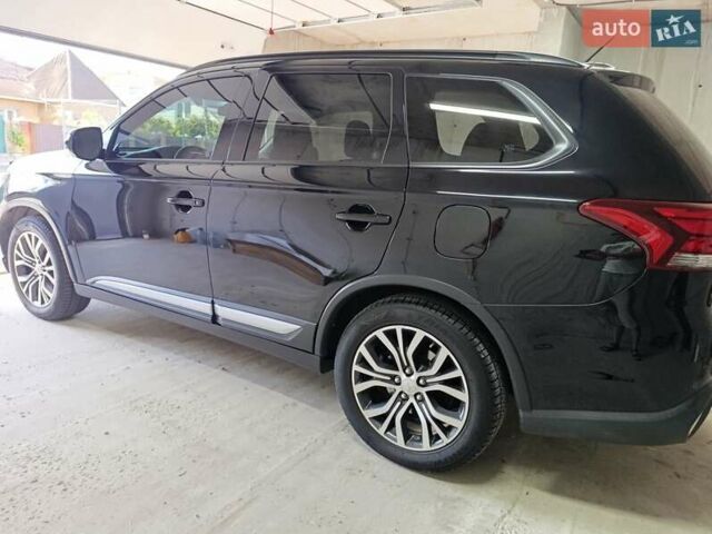 Черный Мицубиси Аутлендер, объемом двигателя 2.36 л и пробегом 120 тыс. км за 16900 $, фото 13 на Automoto.ua