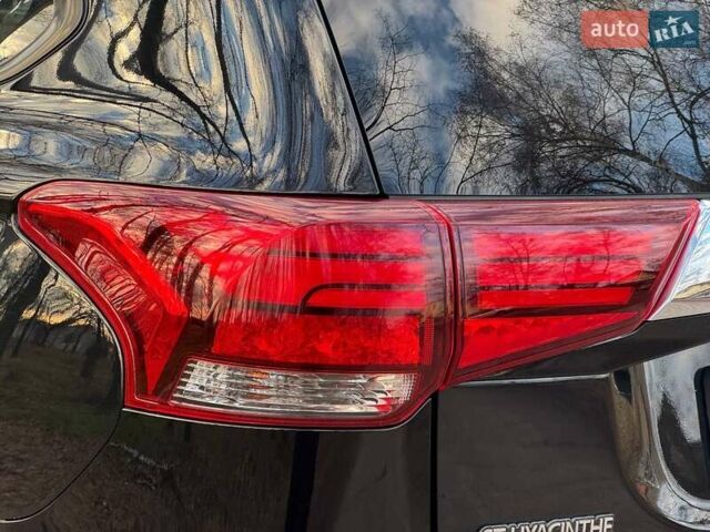 Черный Мицубиси Аутлендер, объемом двигателя 3 л и пробегом 99 тыс. км за 15800 $, фото 17 на Automoto.ua