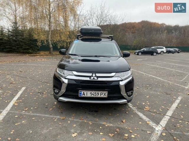 Чорний Міцубісі Аутлендер, об'ємом двигуна 2.36 л та пробігом 192 тис. км за 14200 $, фото 10 на Automoto.ua