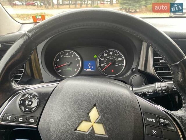 Чорний Міцубісі Аутлендер, об'ємом двигуна 2.36 л та пробігом 192 тис. км за 14200 $, фото 23 на Automoto.ua